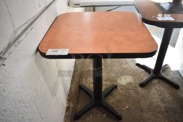 Brown Table on Black Metal Table Base. 24x24x29