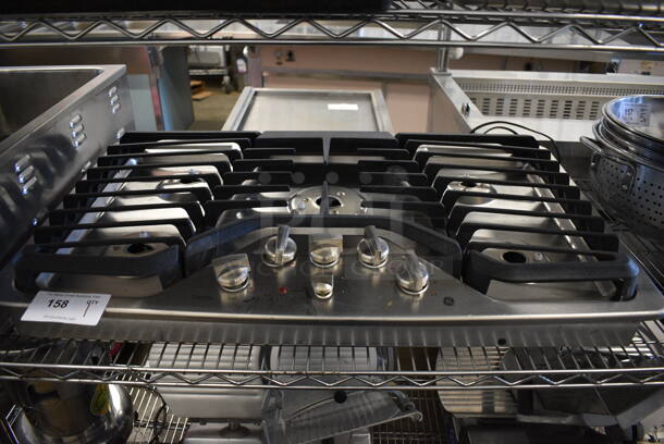 General Electric PGP976SET5SS Stainless Steel Commercial Countertop Natural Gas Powered 5 Burner Range. 37x21x6 - Image 1 of 6