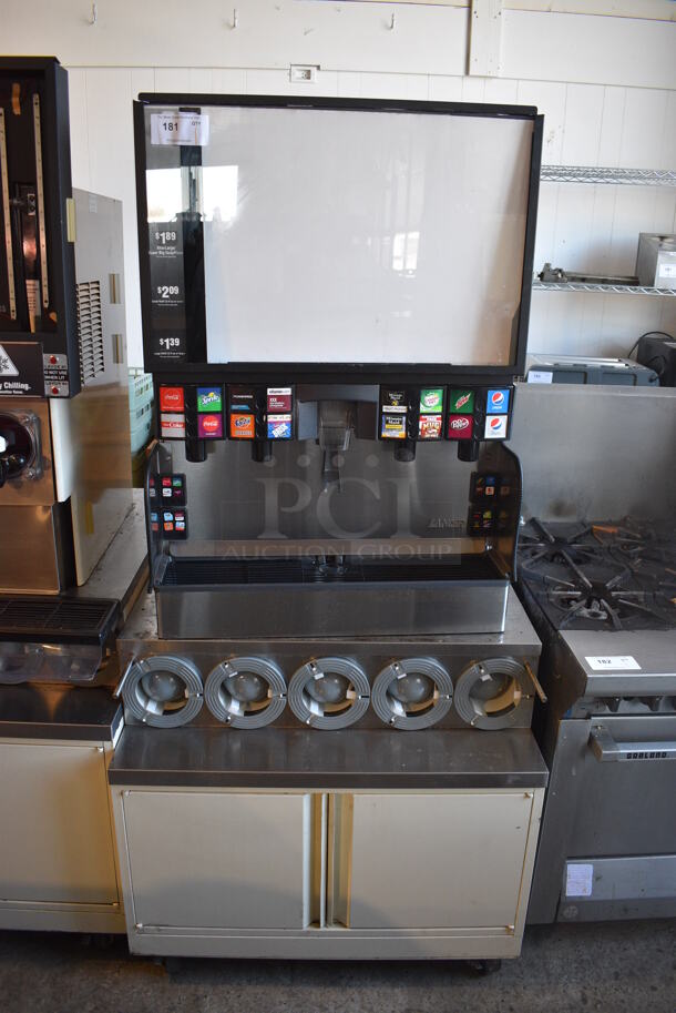 2017 Lancer Model FS30 Stainless Steel Commercial Countertop 16 Flavor Carbonated Beverage Machine on Stainless Steel Soda Station w/ 5 Cup Dispensers and 2 Doors. 115 Volts, 1 Phase. 36x43x75 - Image 1 of 8