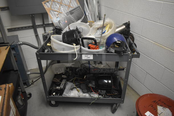 Gray Metal 2 Tier Cart w/ Contents Including Motor, Metal Pieces and Filter on Commercial Casters. - Image 1 of 7