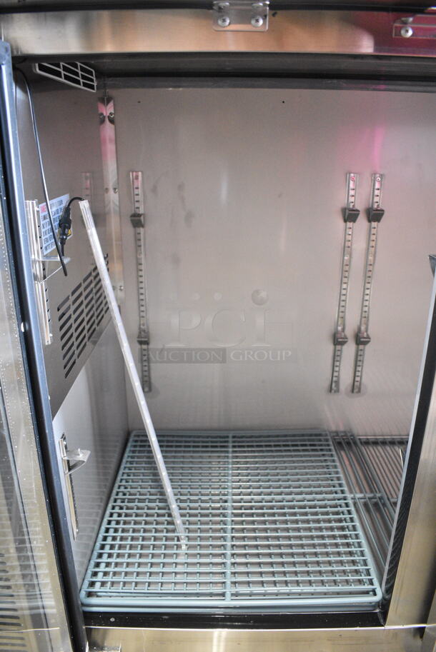 BRAND NEW SCRATCH AND DENT! 2024 Avantco 178UBB72GHCS Stainless Steel Commercial 3 Door Back Bar Cooler Merchandiser. 115 Volts, 1 Phase. Tested and Working! - Image 5 of 7