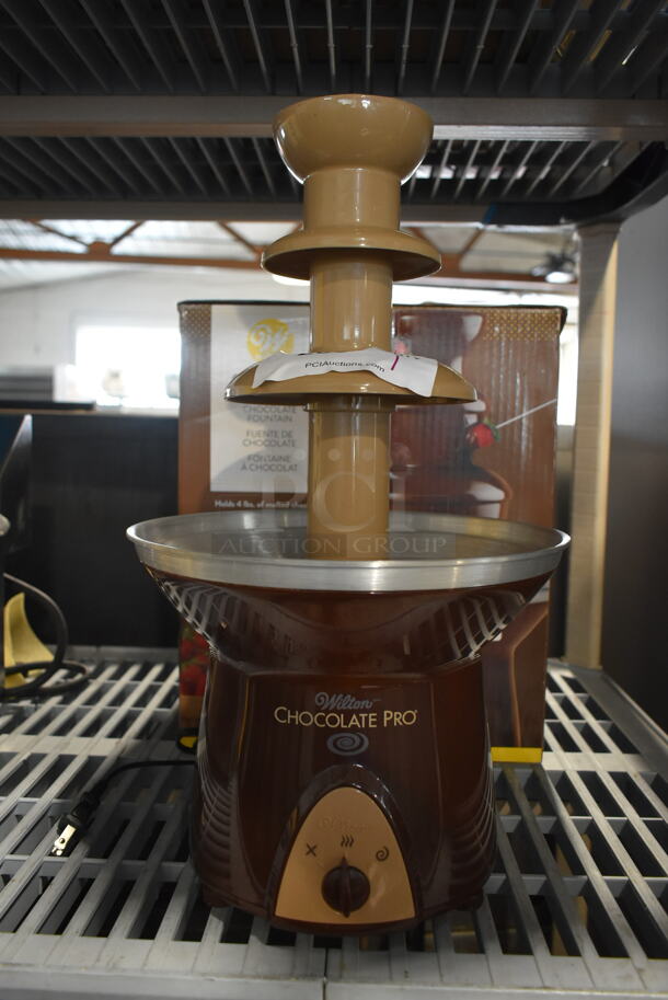 BRAND NEW SCRATCH AND DENT! Wilton TL-094 Chocolate Pro Metal Countertop Chocolate Fountain. - Image 1 of 9