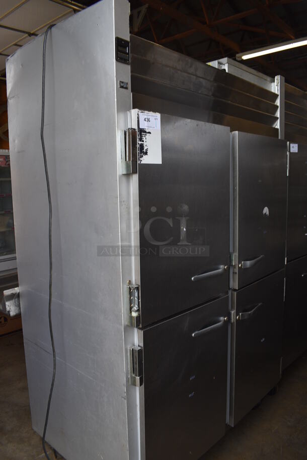 Traulsen Model G20000MC Stainless Steel Commercial 4 Half Size Door Reach In Cooler w/ Poly Coated Racks on Commercial Casters. 115 Volts, 1 Phase. 52x35x83.5. Tested and Working!