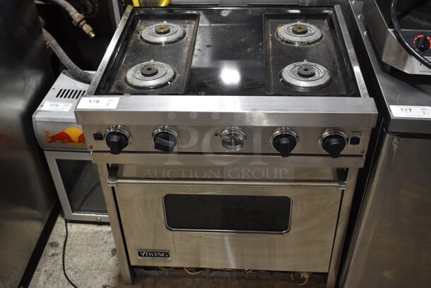 Viking Stainless Steel Natural Gas Powered 4 Burner Range w/ Convection Oven. 