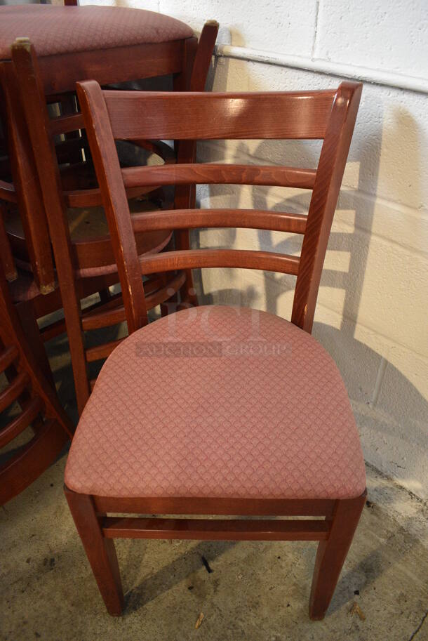 6 Wooden Dining Chairs w/ Red Patterned Seat Cushion. Stock Picture - Cosmetic Condition May Vary. 17x16x34. 6 Times Your Bid!