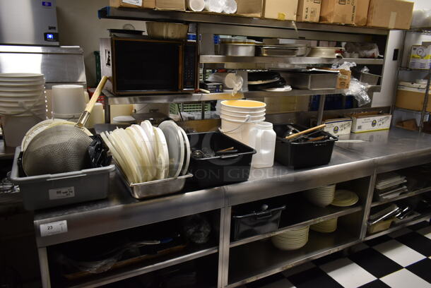ALL ONE MONEY! Lot of Items on Tabletop Including Strainer and Poly Lids. (kitchen #2) - Image 1 of 4