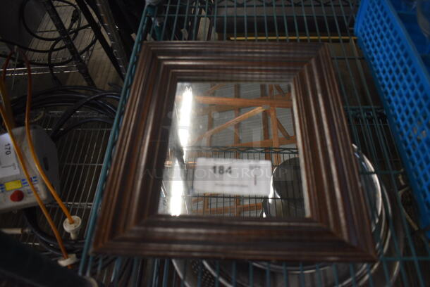Brown Framed Mirror. 12.5x1x14.5