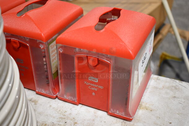4 Tork Xpressnap Clear and Red Poly Napkin Dispensers. 6x5x6. 4 Times Your Bid! - Image 3 of 4