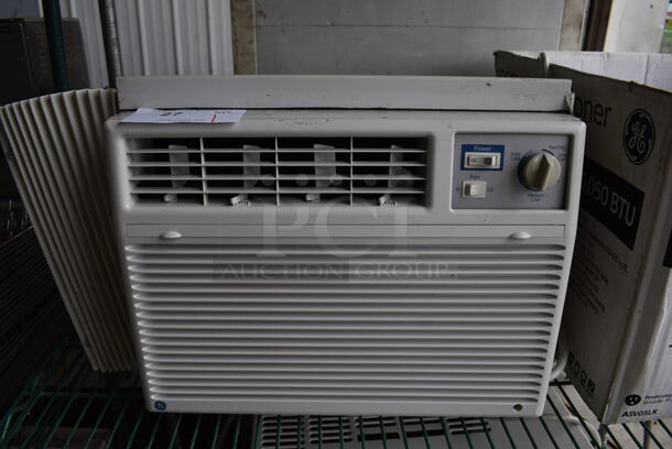 General Electric Model ASV05LKS1 Window Mount Air Conditioning Unit. 115 Volts, 1 Phase. 22x15x15. Tested and Working!
