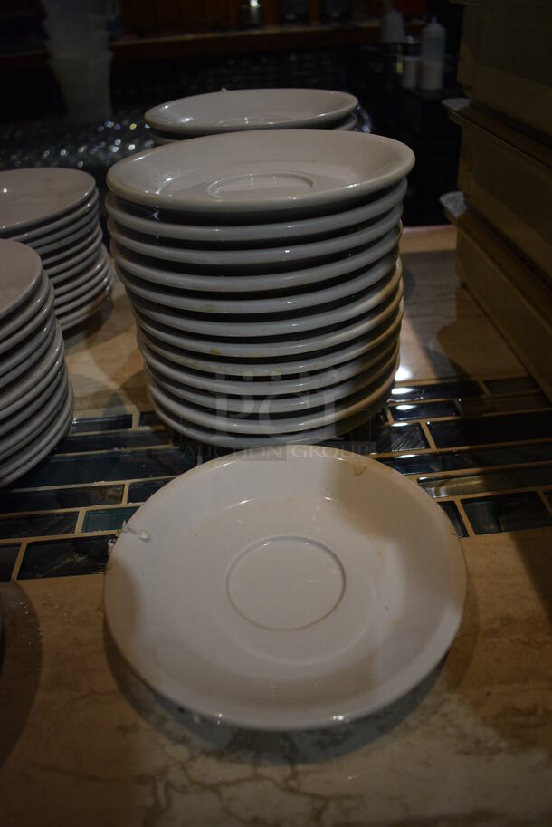 26 White Ceramic Saucers. 7x7x1. 26 Times Your Bid! (bar)