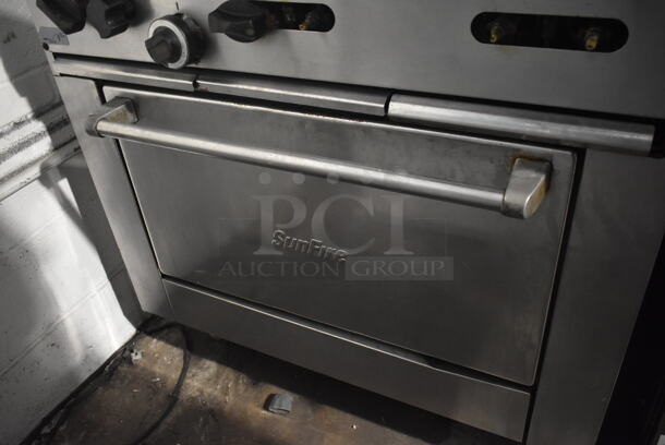 Garland SunFire X36-6R Stainless Steel Commercial Natural Gas Powered 6 Burner Range w/ Oven and Back Splash. - Image 5 of 8