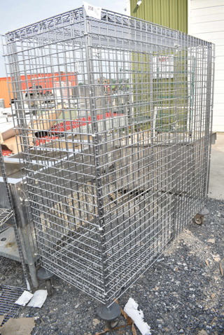 Metro Chrome Finish 2 Tier Wire Shelving Unit w/ Liquor Cage on Commercial Casters. BUYER MUST DISMANTLE. PCI CANNOT DISMANTLE FOR SHIPPING. PLEASE CONSIDER FREIGHT CHARGES. 