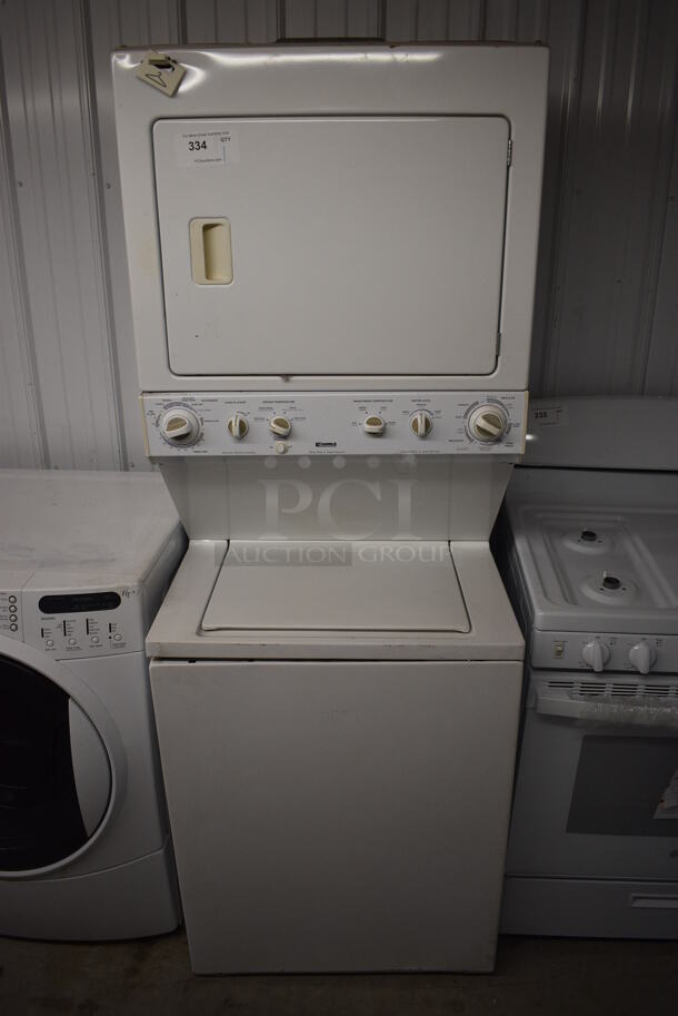 Kenmore Model 417.94812301 Stacked Washer and Dryer. 120/240 Volts. 27x28.5x74 - Image 1 of 11
