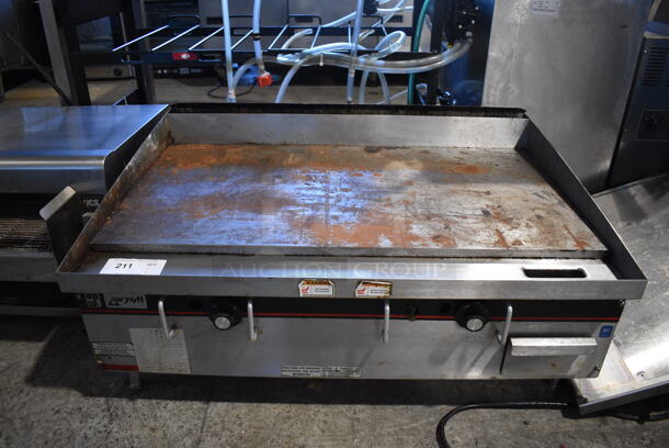 APW Wyott Stainless Steel Commercial Countertop Propane Gas Powered Flat Top Griddle. 36x26x17