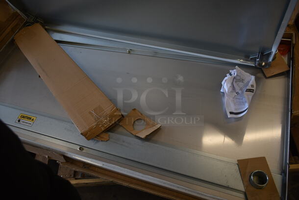 BRAND NEW SCRATCH AND DENT! Regency 600T3060G Stainless Steel Table w/ Under Shelf. Stock Picture Used as Gallery.  - Image 2 of 4