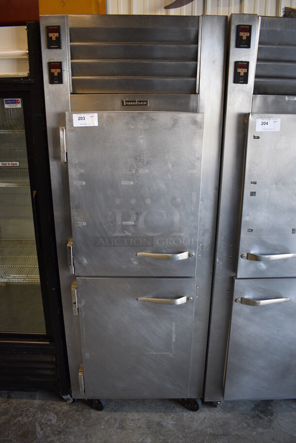 Traulsen Model ADT132WUT-HHS Stainless Steel Commercial Cooler Freezer Combo Unit w/ Metal Racks on Commercial Casters. 115 Volts, 1 Phase. 30x35x83. Tested and Powers On But Does Not Get Cold