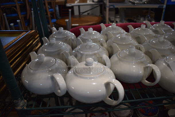12 White Ceramic Tea Pots. 9x5.5x4.5. 12 Times Your Bid! - Image 1 of 3
