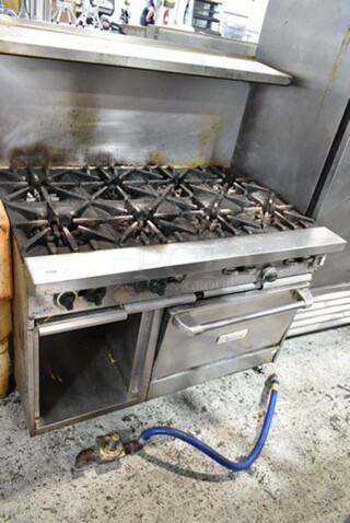 Garland Stainless Steel Commercial Natural Gas Powered 8 Burner Range w/ Convection Oven, Over Shelf and Back Splash. 
