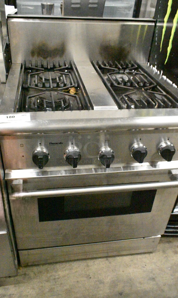 Thermador Stainless Steel Natural Gas Powered 4 Burner Range w/ Oven.  - Image 1 of 9
