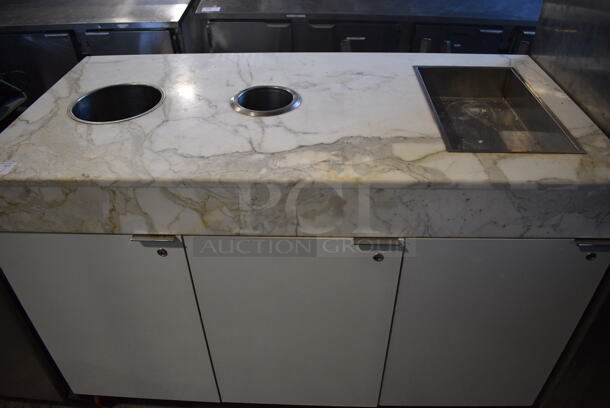 White Cabinet w/ Stone Countertop, 2 Trash Deposit Holes, 3 Doors and 2 Trash Cans on Commercial Casters. 60x30x42