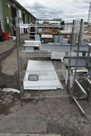 Chrome Finish 4 Tier Wire Shelving Unit. BUYER MUST DISMANTLE. PCI CANNOT DISMANTLE FOR SHIPPING. PLEASE CONSIDER FREIGHT CHARGES. 