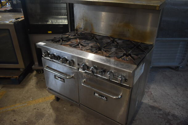 Migali Stainless Steel Commercial Natural Gas Powered 8 Burner Range w/ 2 Ovens, Over Shelf and Back Splash on Commercial Casters.  - Image 3 of 7
