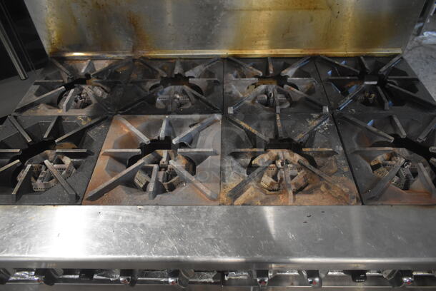 Migali Stainless Steel Commercial Natural Gas Powered 8 Burner Range w/ 2 Ovens, Over Shelf and Back Splash on Commercial Casters.  - Image 4 of 7