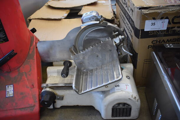 Metal Commercial Countertop Meat Slicer w/ Blade Sharpener. 115 Volts, 1 Phase. 21x14x18. Tested and Does Not Power On