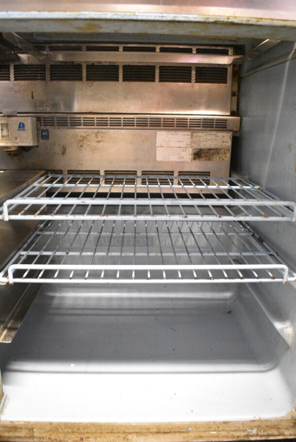 Delfield 4448-12 Stainless Steel Commercial 2 Door Prep Table w/ 2 Lids on Commercial Casters. 115 Volts, 1 Phase. Cannot Test Due To Cut Power Cord - Image 5 of 7