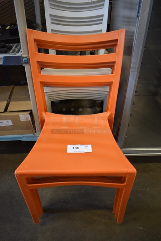 3 Orange Poly Stackable Chairs. 18x19x33.5. 3 Times Your Bid!