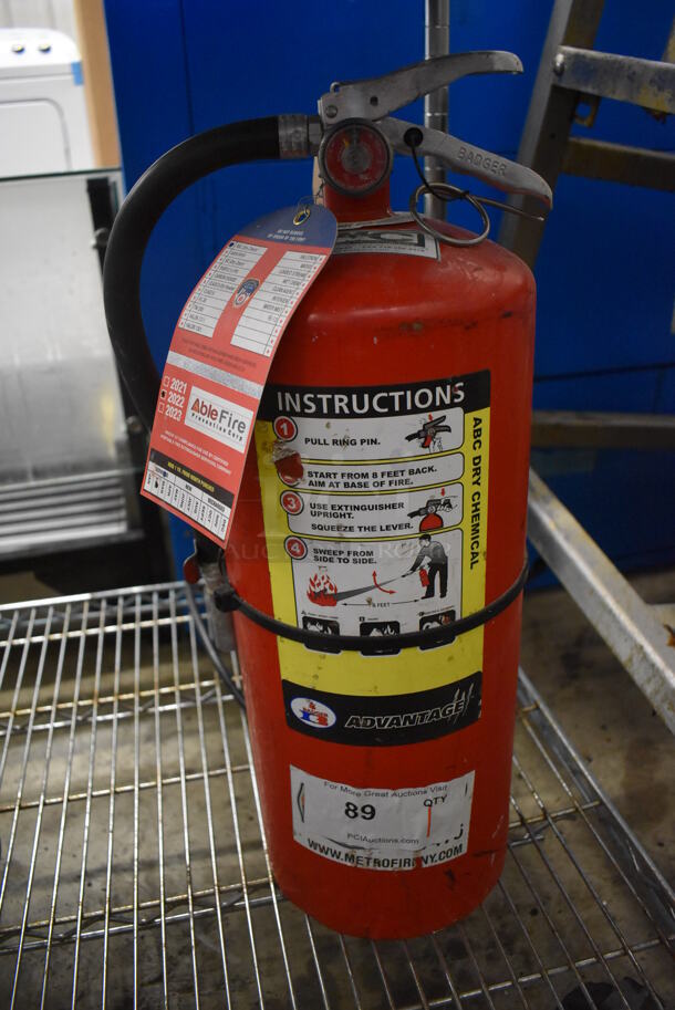 Advantage Dry Chemical Fire Extinguisher. Buyer Must Pick Up - We Will Not Ship This Item.  9.5x7x20
