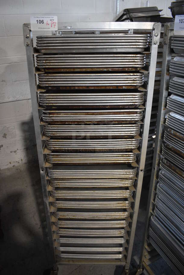 Metal Commercial Pan Transport Rack on Commercial Casters w/ 87 Metal Full Size Baking Pans. 20.5x26.5x63. Pans 18x26x1