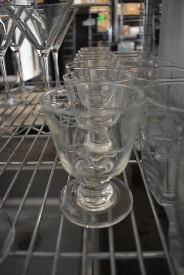 8 Footed Beverage Glasses. 3x3x4. 8 Times Your Bid!