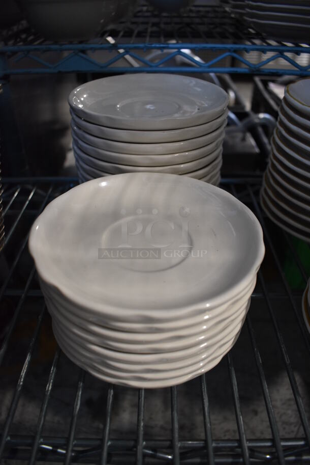 21 White Ceramic Saucers. 5.5x5.5x1. 21 Times Your Bid! - Image 1 of 3