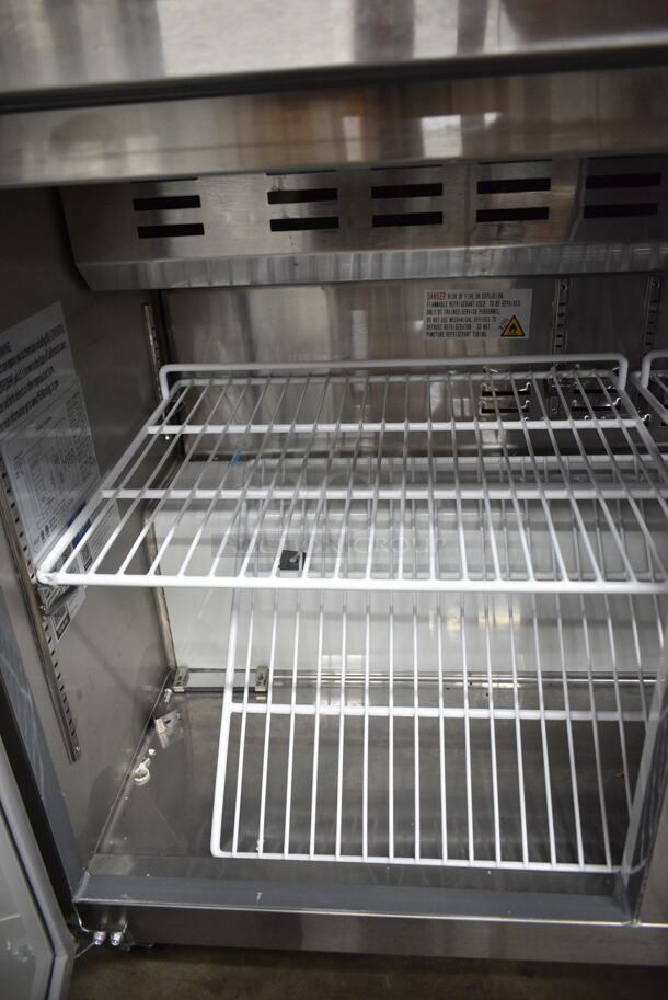 BRAND NEW SCRATCH AND DENT! 2024 Avantco 178APT71HC Stainless Steel Commercial 70" 3 Door Refrigerated Sandwich Prep Table on Commercial Casters. 115 Volts, 1 Phase. Tested and Working!  - Image 8 of 12