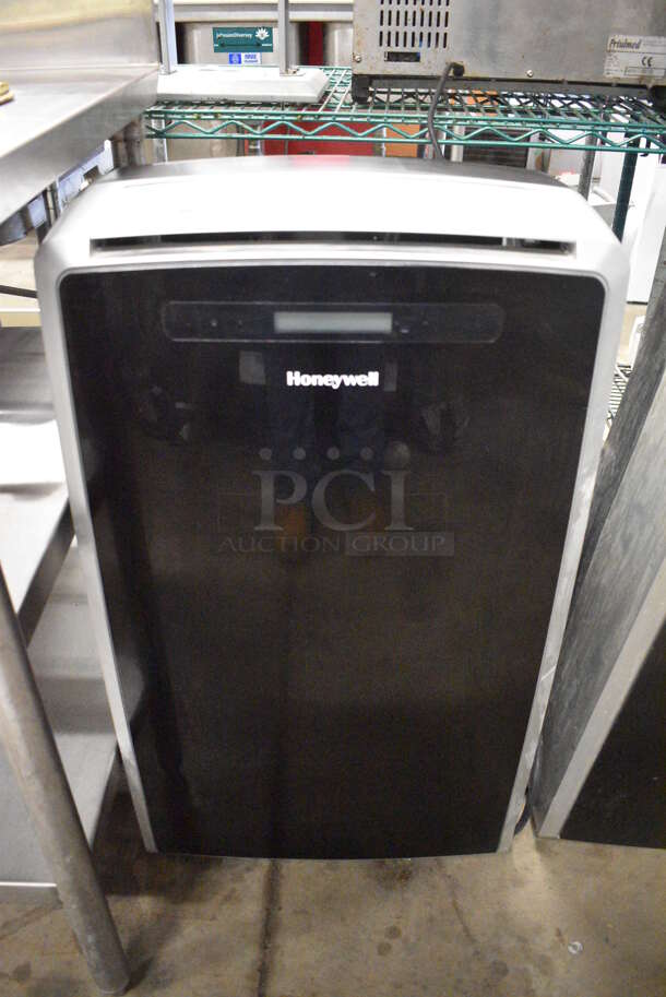 Honeywell Model MM14CCS Portable Air Conditioner on Casters. 115 Volts, 1 Phase. 18x15x34