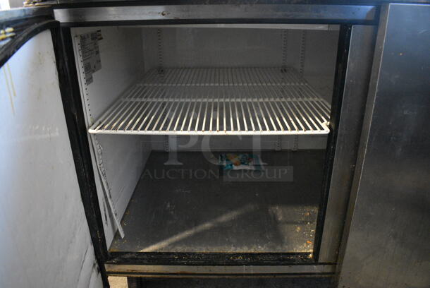 True Model TPP-67 Stainless Steel Commercial Pizza Prep Table on Commercial Casters. 115 Volts, 1 Phase. 67.5x32.5x42. Tested and Working! - Image 7 of 8