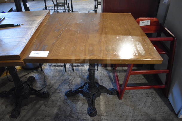 Wood Pattern Dining Table on Black Metal Table Base. Stock Picture - Cosmetic Condition May Vary. 30x30x30