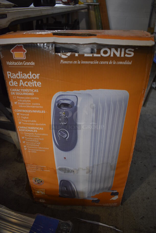 BRAND NEW IN BOX! Pelonis White Metal Radiator.  - Image 1 of 3
