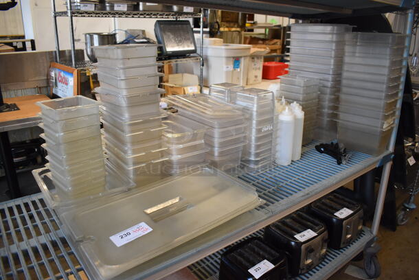 ALL ONE MONEY! Tier Lot of Various Items Including Poly Drop In Bins, Lids and Condiment Bottles - Image 1 of 4