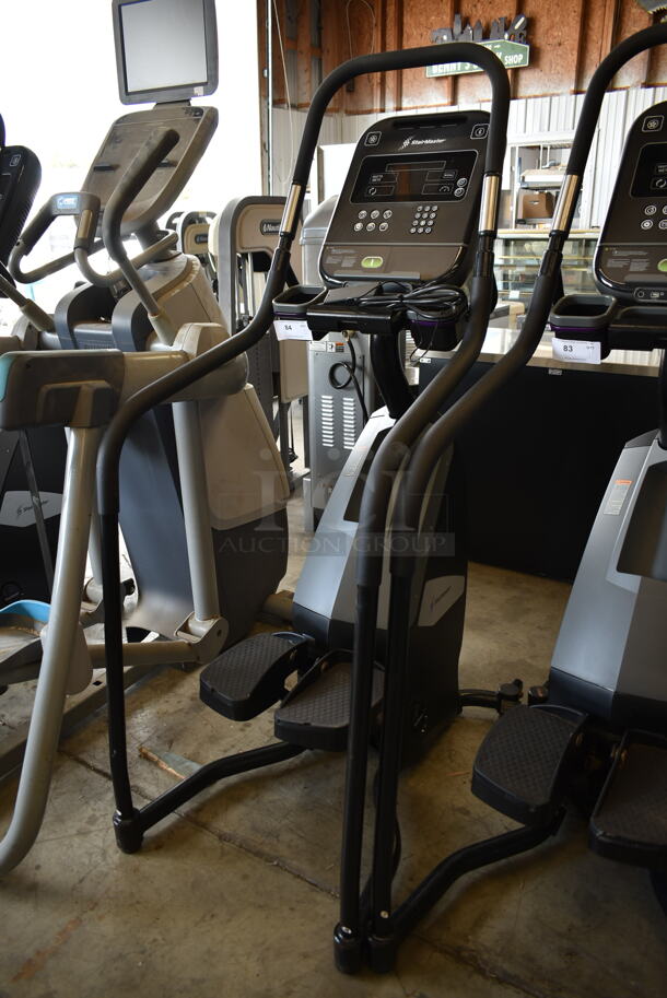Stair Master Commercial Floor Style Stationary Exercise Stepping Machine w/ Monitor and Heart Rate Handle Grip Monitors and Cup Holders. Tested and Does Not Power On - Image 1 of 5