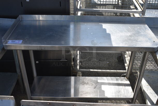 Stainless Steel Table w/ Back Splash and Metal Under Shelf. 47x18x38