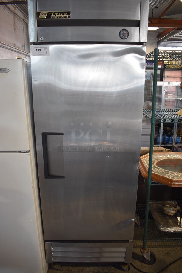 2015 True Model T-19F Stainless Steel Commercial Single Door Reach In Freezer w/ Poly Coated Racks on Commercial Casters. 115 Volts, 1 Phase. 27x30x79. Tested and Powers On But Does Not Get Cold