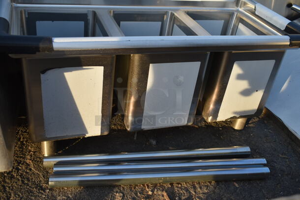 BRAND NEW SCRATCH AND DENT! Regency 600S31014 39" 16-Gauge Stainless Steel Three Compartment Commercial Sink with Galvanized Steel Legs and without Drainboards - 10" x 14" x 12" Bowls. Missing 1 Leg.  - Image 4 of 9