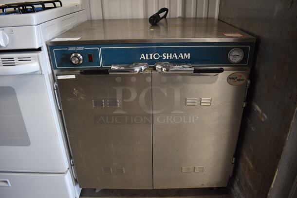 	Alto Shaam Model 730-CTUS Halo Heat Stainless Steel Commercial 2 Door Undercounter Heated Holding Cabinet w/ 6 Full Size Baking Pans on Commercial Casters. 30x26x33. Cannot Test Due To Plug Style