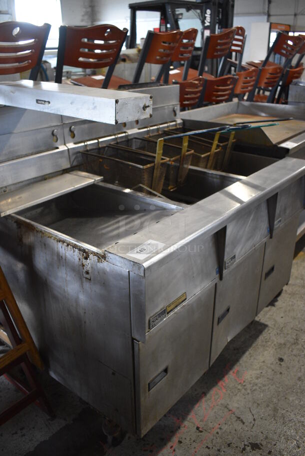 Pitco Frialator Stainless Steel Commercial Natural Gas Powered 2 Bay Deep Fat Fryer w/ Left Side Dumping Station and 4 Metal Fry Baskets on Commercial Casters. 110,000 BTU. 47x34.5x50 - Image 4 of 11