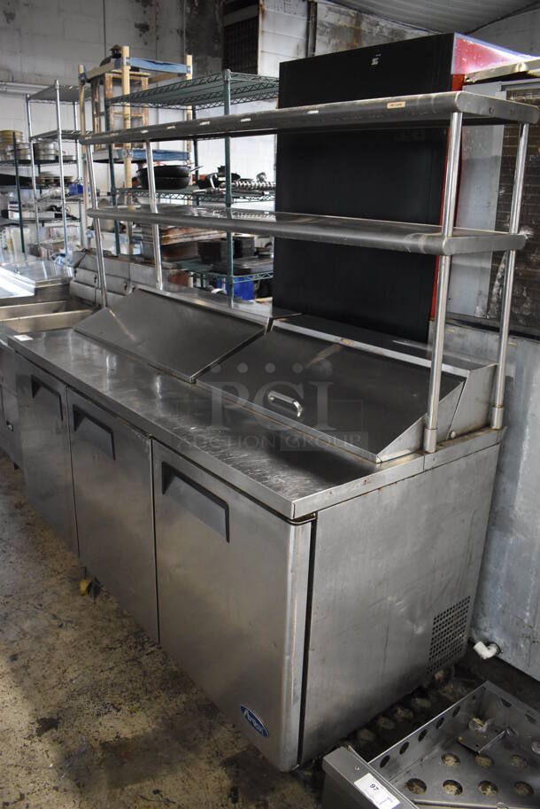 2015 Atosa MSF8304 Stainless Steel Commercial Sandwich Salad Prep Table Bain Marie Mega Top w/ 2 Over Shelves on Commercial Casters. 115 Volts, 1 Phase. 73x32x69. Tested and Working!
