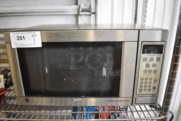 General Electric Model JES1142SF001 Metal Countertop Microwave Oven w/ Plate. 21x15x12