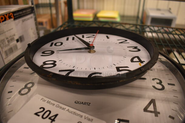 2 Various Clocks. 8.5x1.5x8.5, 13.5x2x13.5. 2 Times Your Bid! - Image 2 of 3