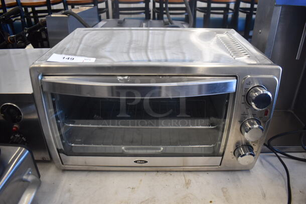 Oster TSSTTVXXLL Toaster Oven 120 Volts 1 Phase.  Tested and Working!
